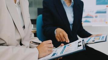 Group of business people discussing finance and investment during the meeting. video