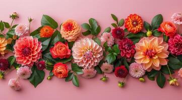 Pink and Orange Floral Arrangement on a Light Pink Background photo