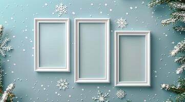 White Picture Frames With Winter Decor on Blue Background photo