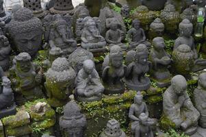 Carving crafts from Buddhist stone relics around Mendut temple photo