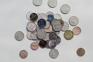 A messy pile of rupiah coins photo