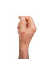 Hand holding something small, isolated on white background. Gesture indicating a pinch or grasp, photo