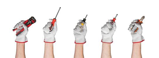 Assorted hand tools including screwdrivers, pliers, and crimping tool. Essential for construction, photo