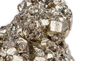 Macro mineral stone Pyrite gold on white background photo