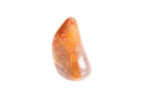Macro mineral stone Carnelian on white background photo