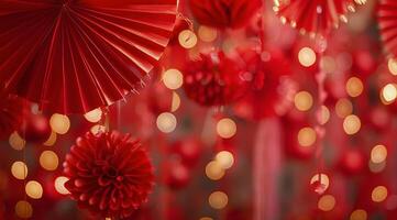Red Folding Fans Hanging Against a Bokeh Background photo