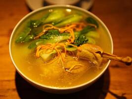 The chicken soup cooked in the traditional Chinese cooking way photo
