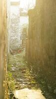 The beautiful traditional Chinese village view with the classical architecture and the narrow lane as background photo