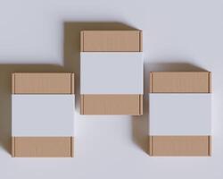Brown cardboard boxes with a label white color isolated on gray background photo