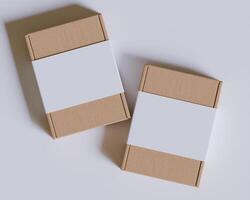 Brown cardboard boxes with a label white color isolated on gray background photo