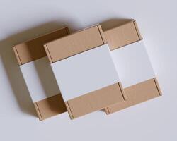 Brown cardboard boxes with a label white color isolated on gray background photo