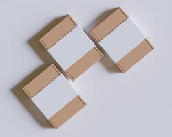 Brown cardboard boxes with a label white color isolated on gray background photo
