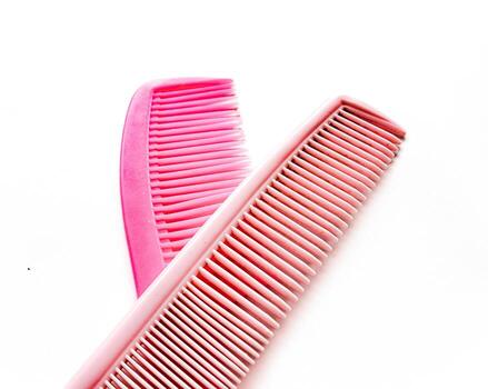 rosado pelo peine aislado en blanco antecedentes foto