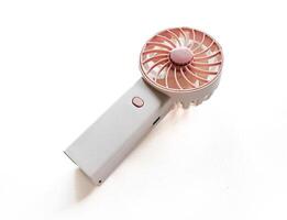 Portable mini fan on white background photo