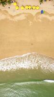 Aerial View Of Crystal Clear Ocean Waves Crashing On Tropical Sandy Beach. video