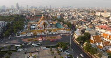 4k An Aerial view Hyperlapse Footage of the Red Giant Swing and Suthat Thepwararam Temple, The most famous tourist attraction in Bangkok, Thailand video