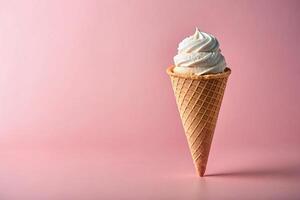 Ice cream cone with strawberry topping on a light pink background. Copy space photo