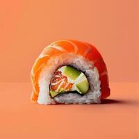 Close-up of a delicious salmon sushi roll with avocado and cream cheese filling on a vibrant orange background. Japanese cuisine. photo