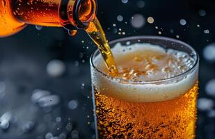 Pouring a glass of golden beer, creating a frothy head, ready to be enjoyed photo