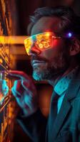 Man in suit and tie with LED lit smart glasses pointing at interactive screen showing graphs, charts, data photo