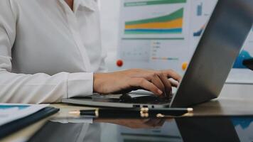 Close up image of woman hands typing on laptop computer keyboard and surfing the internet on office table, online, working, business and technology, internet network communication concept video