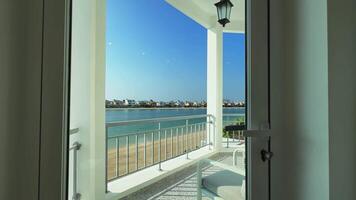 Guest room in a private expensive villa in Dubai. Panoramic sea view on a cloudless day video