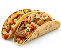 two tacos with vegetables on a white background photo
