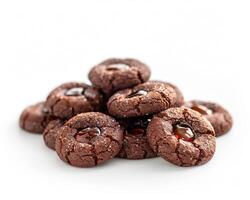 chocolate cookies with caramel on top photo