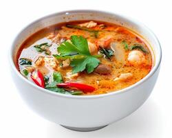 a bowl of soup with meat and vegetables photo