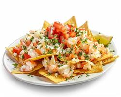 a plate of nachos with shrimp and tomatoes photo