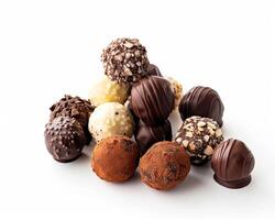 chocolates are arranged in a pile on a white background photo