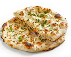 two flatbreads with cheese and herbs photo