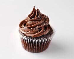 a chocolate cupcake with frosting on top photo
