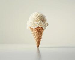an ice cream cone with white frosting on top photo