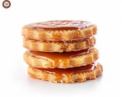 a stack of three cookies with caramel sauce photo