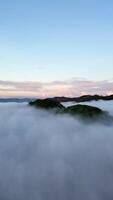 Vertical Drone Footage of fog in the mountain at Gorontalo, Indonesia video