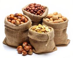 nut bags with nuts in them on a white background photo