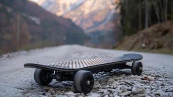 Off-Road Electric Skateboard on Rocky Mountain Path in Autumn photo