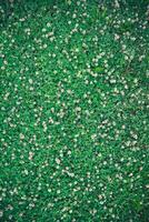 natural background. Green field with white clover flowers, top view photo