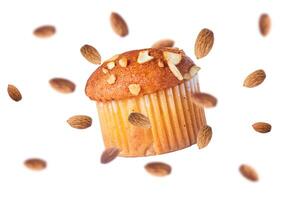 Muffin with almonds isolated on white background. photo