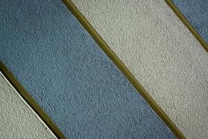 texture of a wall painted with stripes as a background with diagonals photo