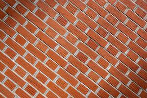 Red brick wall. Texture of old dark brown and red brick wall panoramic backgorund. photo