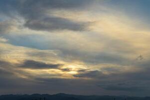 Beautiful scenic gradient sky between hot and cool tone of twilight sky with a cloud. 1 photo