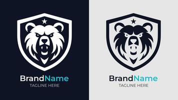 A simple black and white silhouette logo of an angry bear head with open mouth showing fangs. Enclosed within a shield with a small star shape above its head vector
