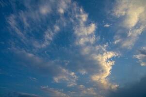 The gathering clouds during sunset create abstract painting patterns in the western sky. 2 photo