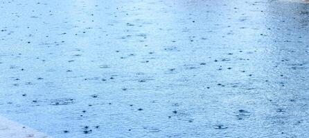 Water blue surface abstract background. Waves and ripples of cosmetic moisturizer with bubbles 2 photo
