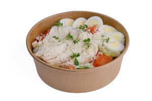 Caesar salad with chicken on a white background 1 photo