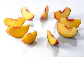 Peach isolated. Whole peach with a slice on white background. Peach fruit with leaf and cut pieces. Full depth of field. 1 photo