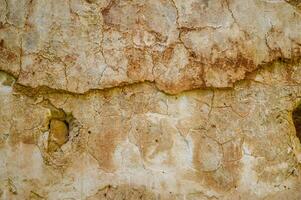yellow texture of cracked concrete wall. Abstract background of a crack in a concrete wall. 2 photo