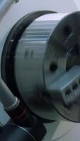 Rotating Metal machine with drum. Media. Rotating round part in production machine. Metal drum or parts rotate at factory video